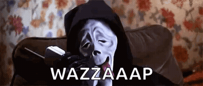 Grim Reaper Sitting On Couch Talking On Cell Phone GIF