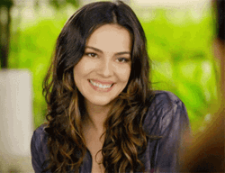Grinning Girl Slow Wink GIF