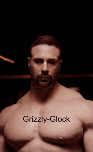Grizzly-Glock Is Written On The Chest Of A Man GIF