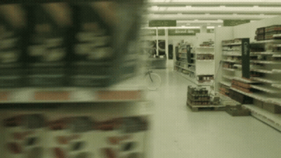Grocery Store Aisle Sign About Us GIF