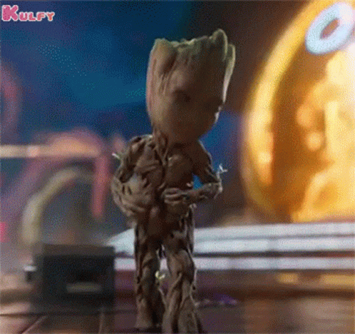 Groot Dancing in Front of Yellow Object