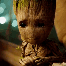 Sad Groot Holding Plant GIF