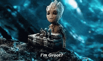 Groot Sitting On Rock Holding Box GIF