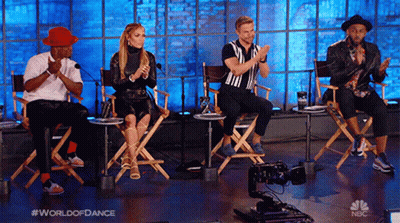 Group Applauding In Director's Chairs GIF