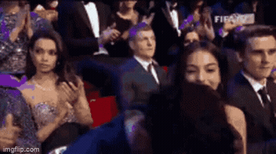 Group Applauding Man In Suit And Tie GIF