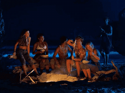 Group Around Campfire On Beach At Night GIF