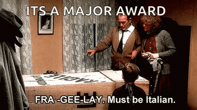 Group Around Table Saying Fra-Gee-Lay Must Be Italian GIF