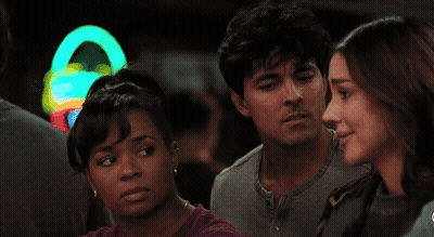 Group At Bar With Seahawk Banner GIF
