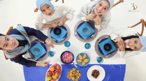 Group At Table With Food And SD Watermark GIF