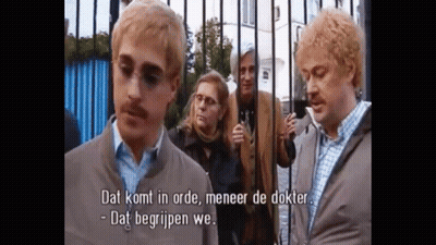 Group Behind Fence Saying Dat Komt In Orde GIF