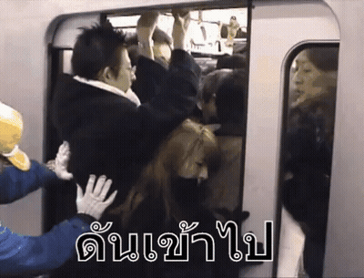 Group Boarding Train With Foreign Language GIF