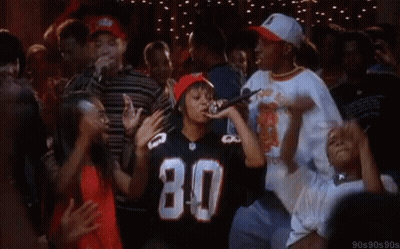 Group Dancing In Club With Man Holding Microphone GIF