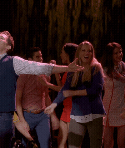 Group Dancing In Dark Room Man Pointing At Sky GIF