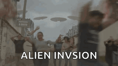 Group Dancing In Front Of Alien Invision Sign GIF