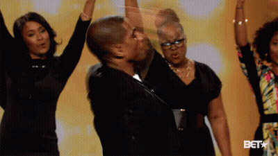 Group Dancing In Front Of Bet Sign GIF