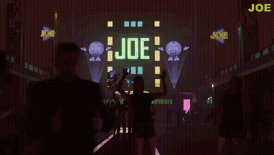 Group Dancing In Front Of Joe Sign GIF
