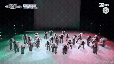 Group Dancing In Front Of Mnet Sign GIF