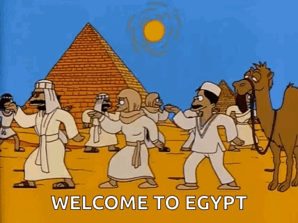 Group Dancing In Front Of Pyramid GIF
