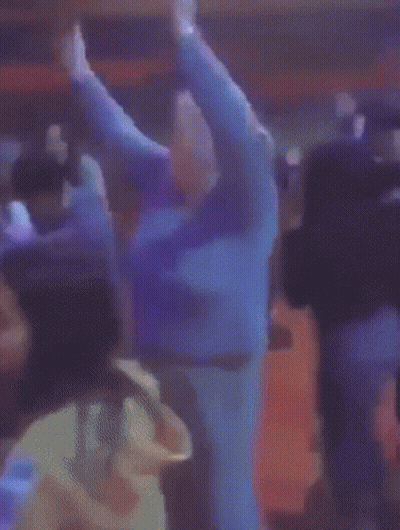 Group Dancing In Purple Lights GIF