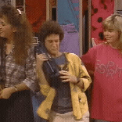 Group Dancing In Room With Man Holding Briefcase GIF