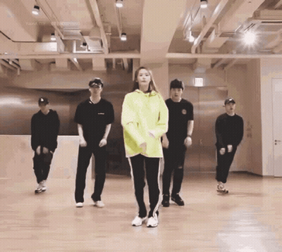 Group Dancing Near Exit Sign
