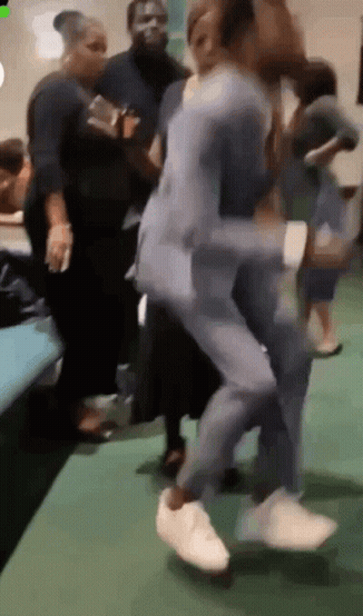 Group Dancing On Green Floor GIF