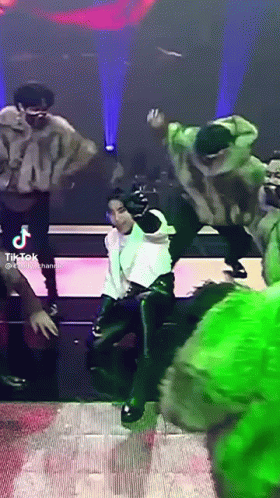 Group Dancing On Stage One In White Shirt GIF