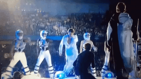 Group Dancing On Stage With Crowd GIF