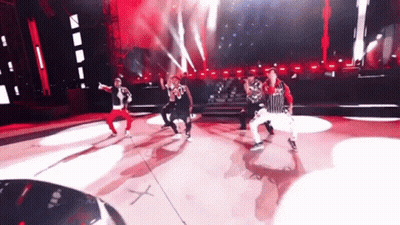 Group Dancing On Stage With Number 30 Shirt GIF