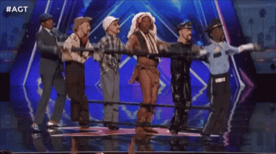 Group Dancing On Stage With Police Officer GIF