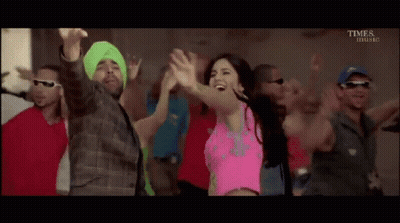 Group Dancing With Woman In Pink Top GIF