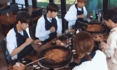 Group Eating At Table GIF