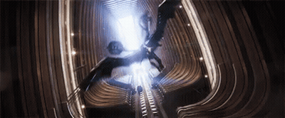 Group Flying Through Dark Tunnel GIF