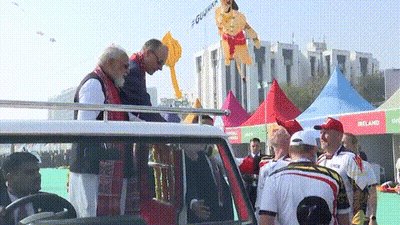 Group Gathered In Front Of Ireland Tent GIF