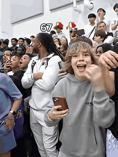 Group Gathered In Front Of Sign Saying 67 GIF