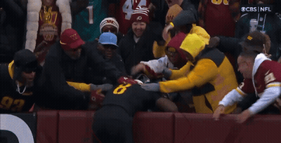 Group Gathered In Front Of Touch Sign GIF