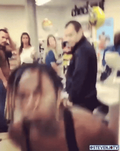 Group Gathered In Room With Check Sign GIF