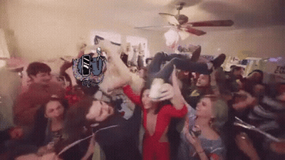 Group Gathered In Room With The Cup Sign GIF