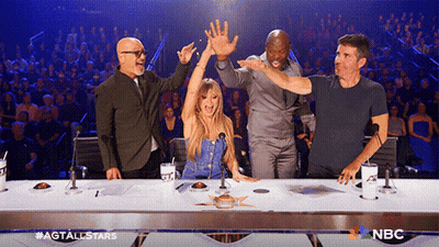 Group High Five With NBC Logo GIF