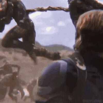 Group Holding Hands In Field GIF