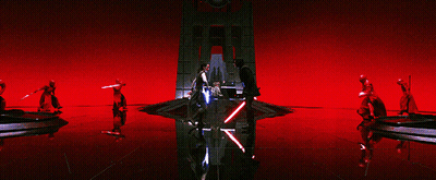 Group Holding Lightsabers In Red Room GIF