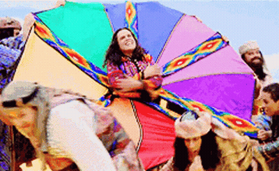 Group Holding Rainbow-Colored Kite GIF