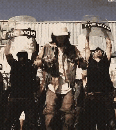 Group Holding Riot Shields Saying Mob GIF