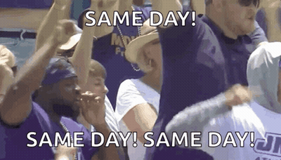 Group Holding Signs Saying Same Day GIF