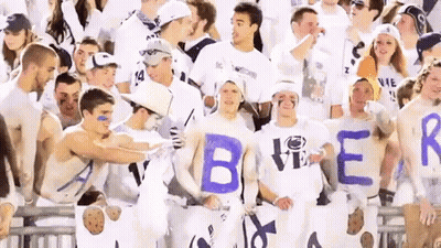 Group Holding Signs That Say Beer GIF