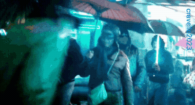 Group Holding Umbrellas 2023 GIF
