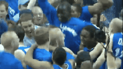 Group Huddled In Blue Shirts Saying State GIF