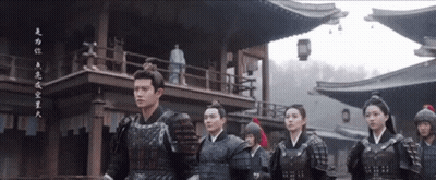 Group In Armor In Front Of Building With Chinese Writing GIF