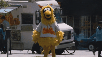 Group In Clown And Scream Masks Standing Together GIF