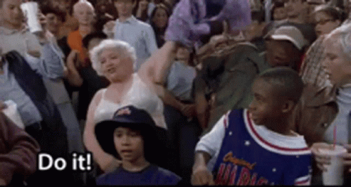 Group In Crowd Holding Sign Saying Do It GIF